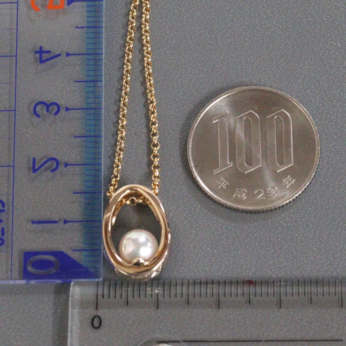 Mikimoto K18 yellow gold pearl pendant with 42cm chain, measuring 11mm by 16mm, weighing 7.1g