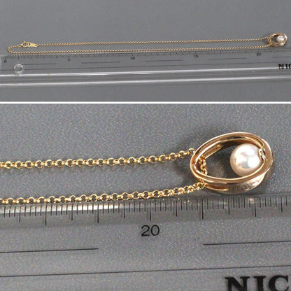 Mikimoto K18 yellow gold pearl pendant with 42cm chain, measuring 11mm by 16mm, weighing 7.1g