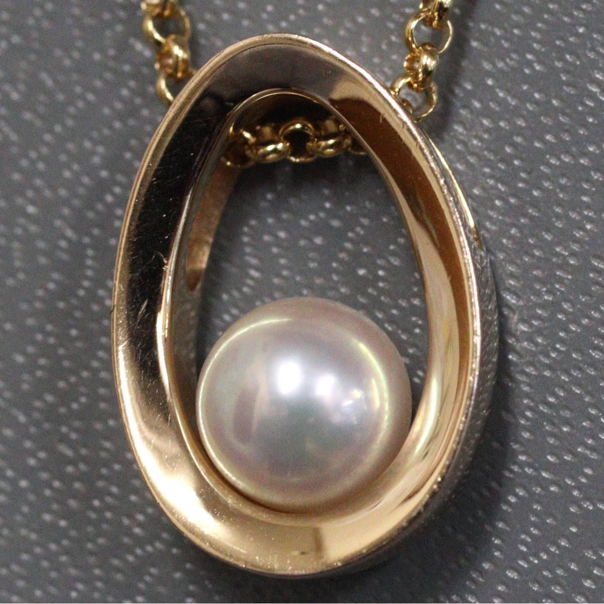 Mikimoto K18 yellow gold pearl pendant with 42cm chain, measuring 11mm by 16mm, weighing 7.1g