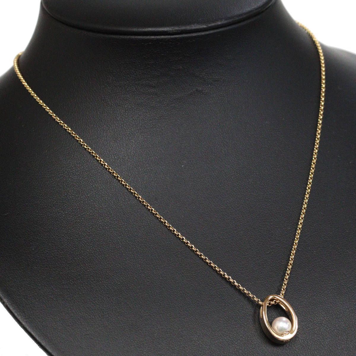 Mikimoto K18 yellow gold pearl pendant with 42cm chain, measuring 11mm by 16mm, weighing 7.1g