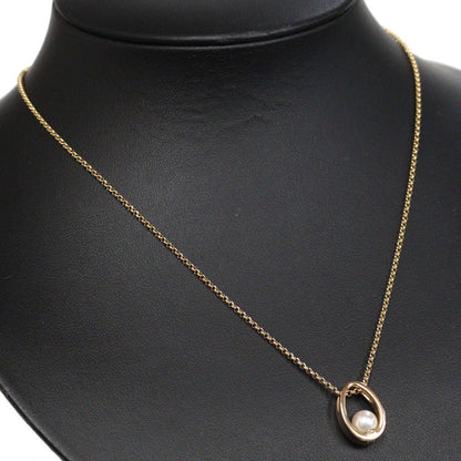 Mikimoto K18 yellow gold pearl pendant with 42cm chain, measuring 11mm by 16mm, weighing 7.1g