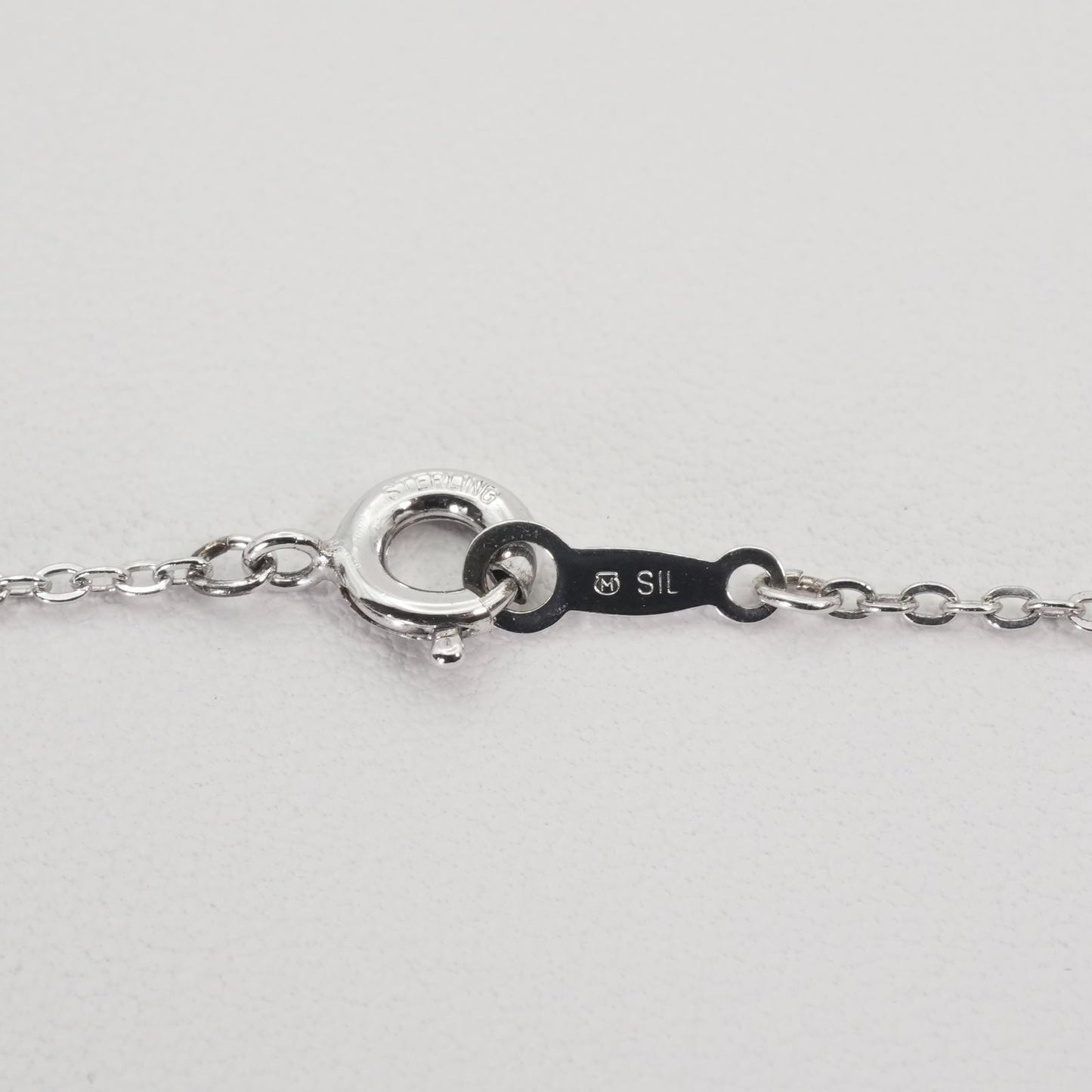 Mikimoto Baby Pearl Necklace with silver bouquet design, model 26-0321, shown on white background