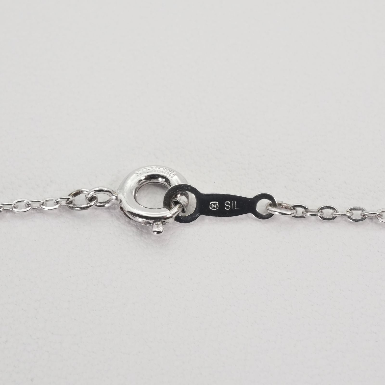 Mikimoto Baby Pearl Necklace with silver bouquet design, model 26-0321, shown on white background
