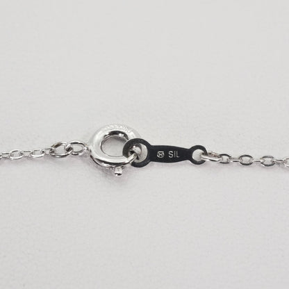 Mikimoto Baby Pearl Necklace with silver bouquet design, model 26-0321, shown on white background