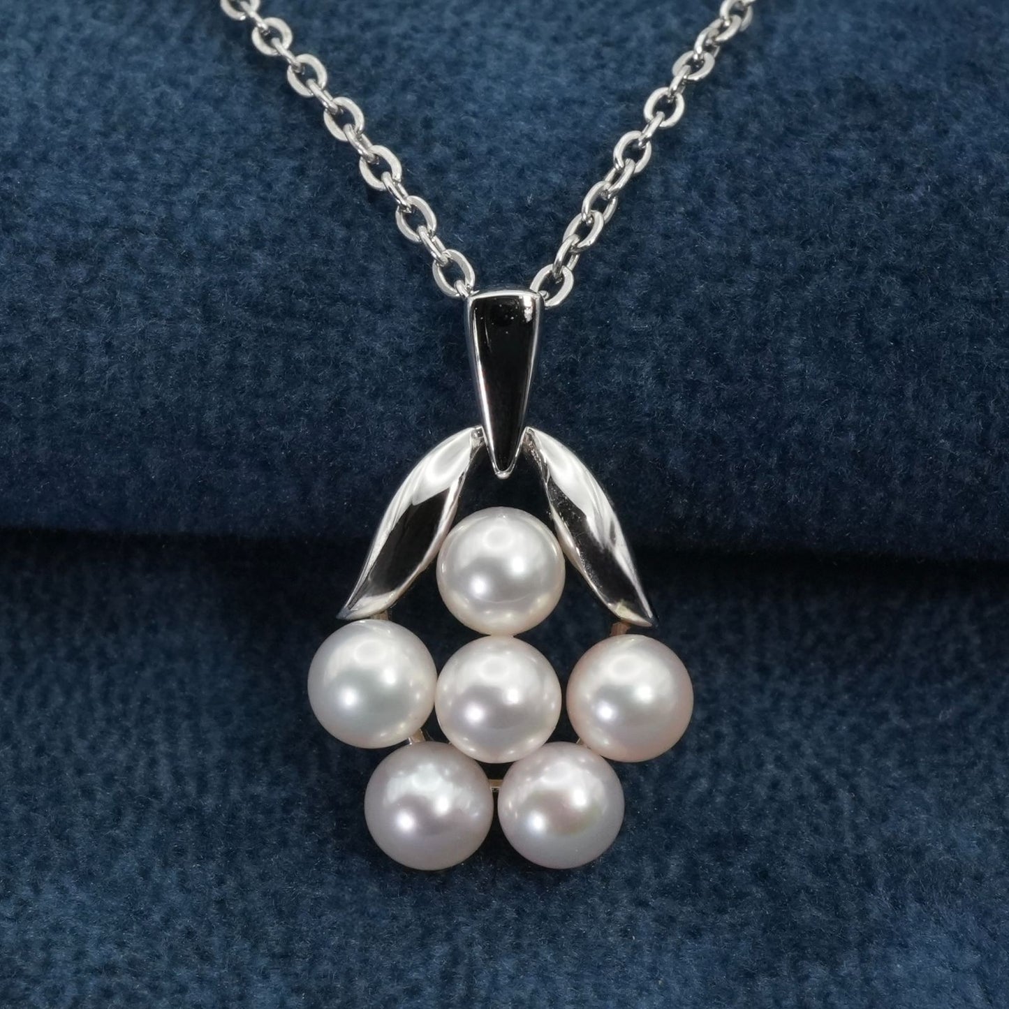 Mikimoto Baby Pearl Necklace with silver bouquet design, model 26-0321, shown on white background