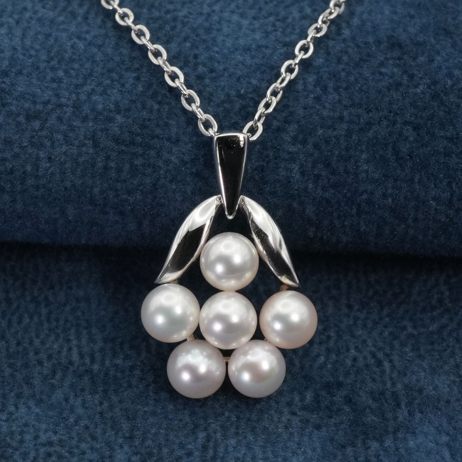 Mikimoto Baby Pearl Necklace with silver bouquet design, model 26-0321, shown on white background