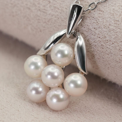Mikimoto Baby Pearl Necklace with silver bouquet design, model 26-0321, shown on white background