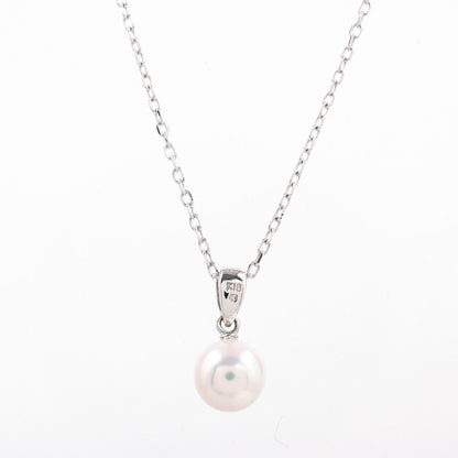 Mikimoto pearl necklace with 7.4mm white pearls on a 40cm silver chain