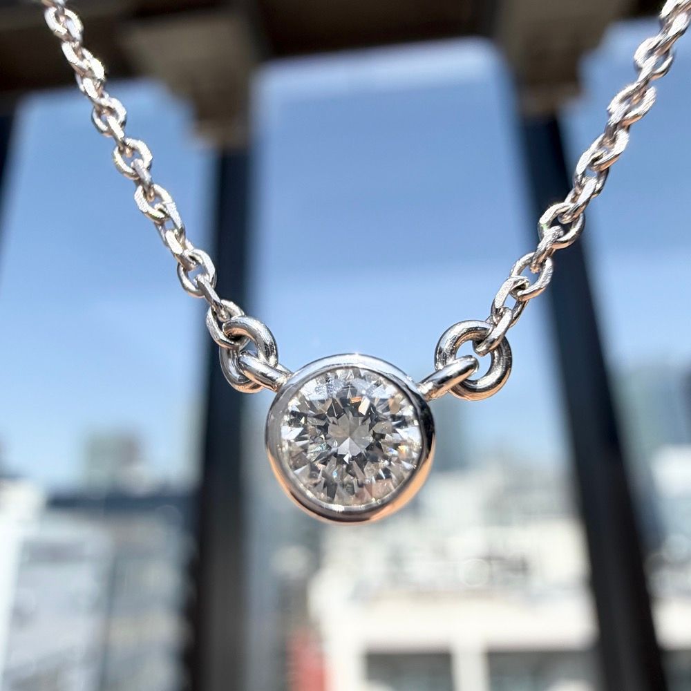 Mikimoto WGK14 0.20ct diamond necklace with 40cm chain displayed with necklace case