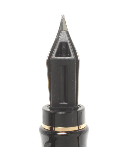 Waterman fountain pen converter measuring 14 cm for ink refilling with a clear body and blue piston mechanism
