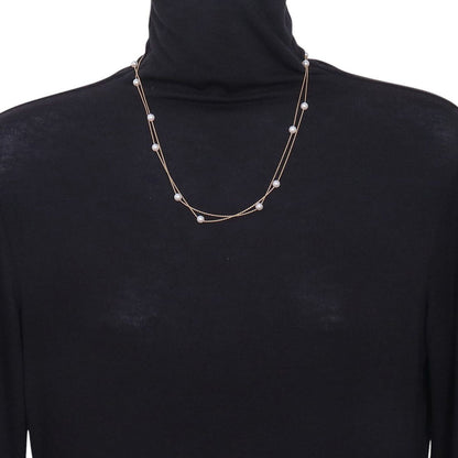 Tasaki long pearl necklace with 14 Akoya pearls sized 5.5 to 5.8mm on 18K yellow gold chain 100cm