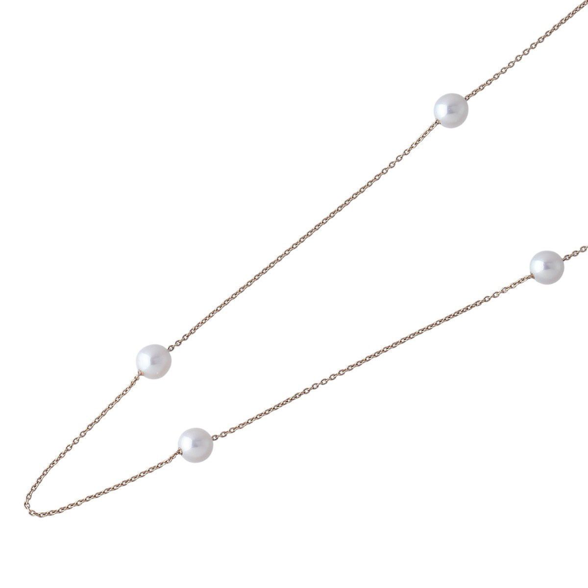 Tasaki long pearl necklace with 14 Akoya pearls sized 5.5 to 5.8mm on 18K yellow gold chain 100cm