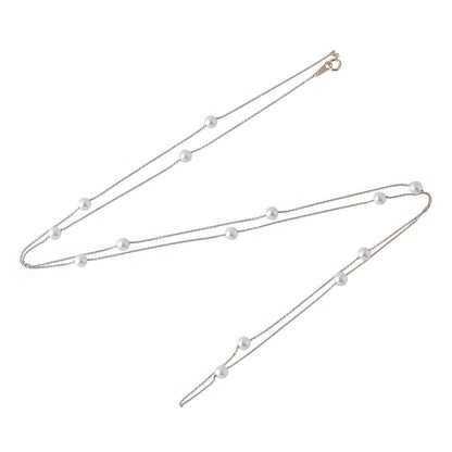 Tasaki long pearl necklace with 14 Akoya pearls sized 5.5 to 5.8mm on 18K yellow gold chain 100cm