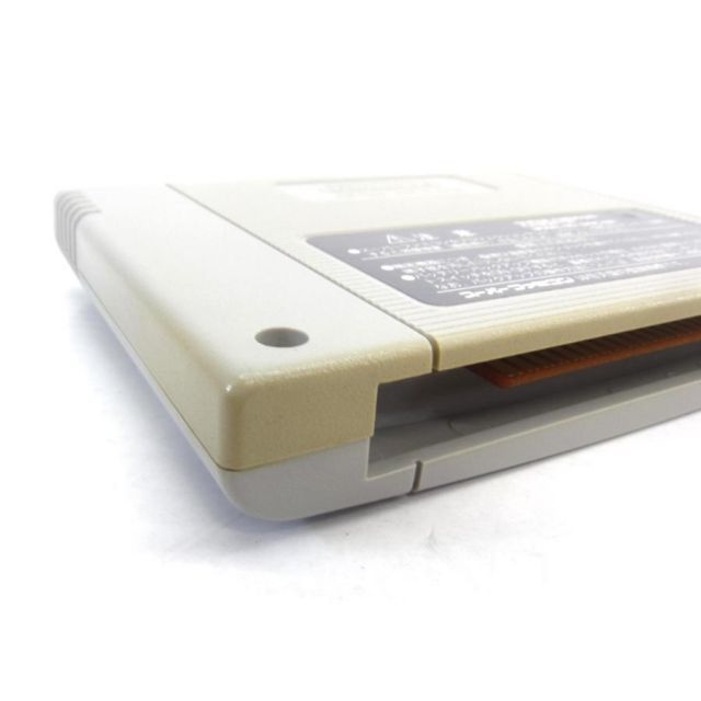 CLOCK TOWER Super Famicom game cartridge UR1042 with visible scuffs and discoloration