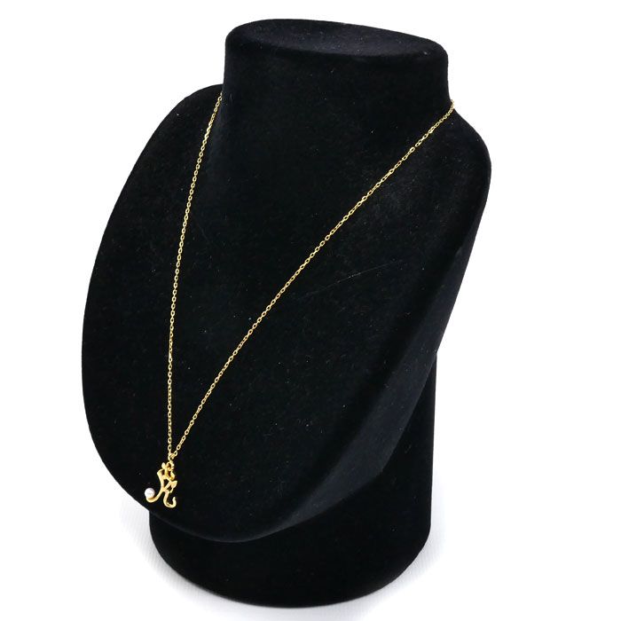 Mikimoto Baby Pearl Initial K Necklace featuring a yellow gold pendant and delicate chain