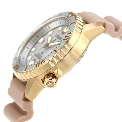 Citizen PROMASTER EO2023-00A men's diver wristwatch with silver dial, pink beige urethane band, and gold-plated stainless steel case