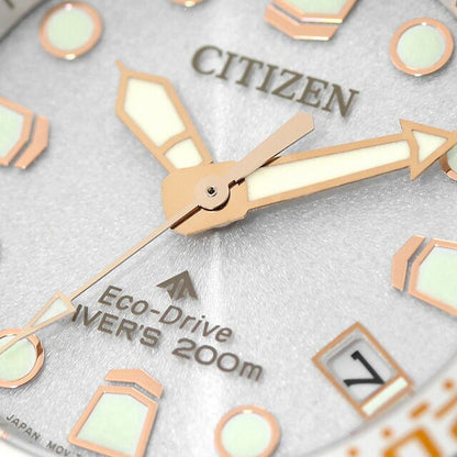 Citizen PROMASTER EO2023-00A men's diver wristwatch with silver dial, pink beige urethane band, and gold-plated stainless steel case