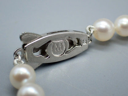 MIKIMOTO Akoya Pearl Necklace with 5.5mm pearls, 38cm length, displayed with original case