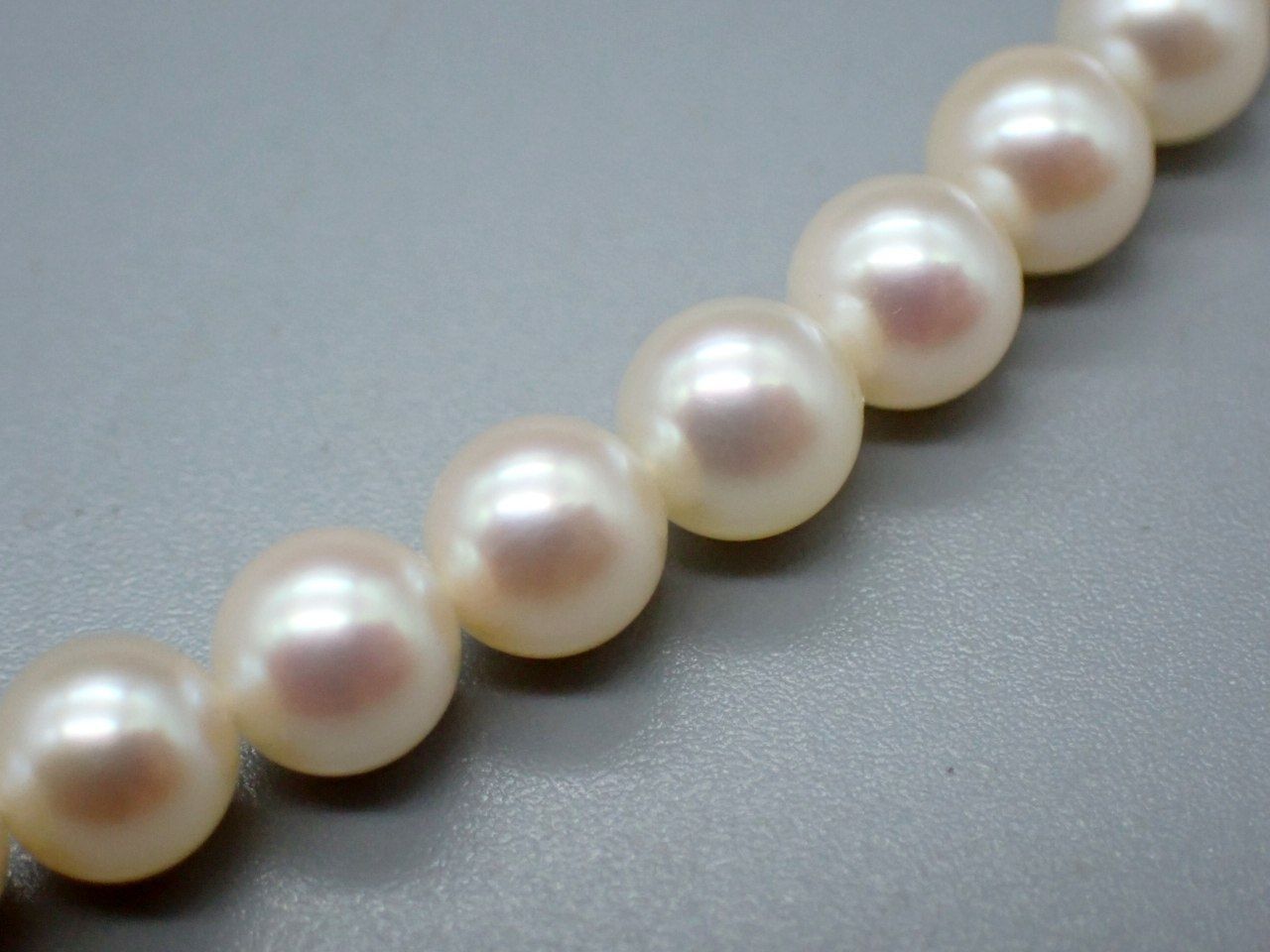 MIKIMOTO Akoya Pearl Necklace with 5.5mm pearls, 38cm length, displayed with original case