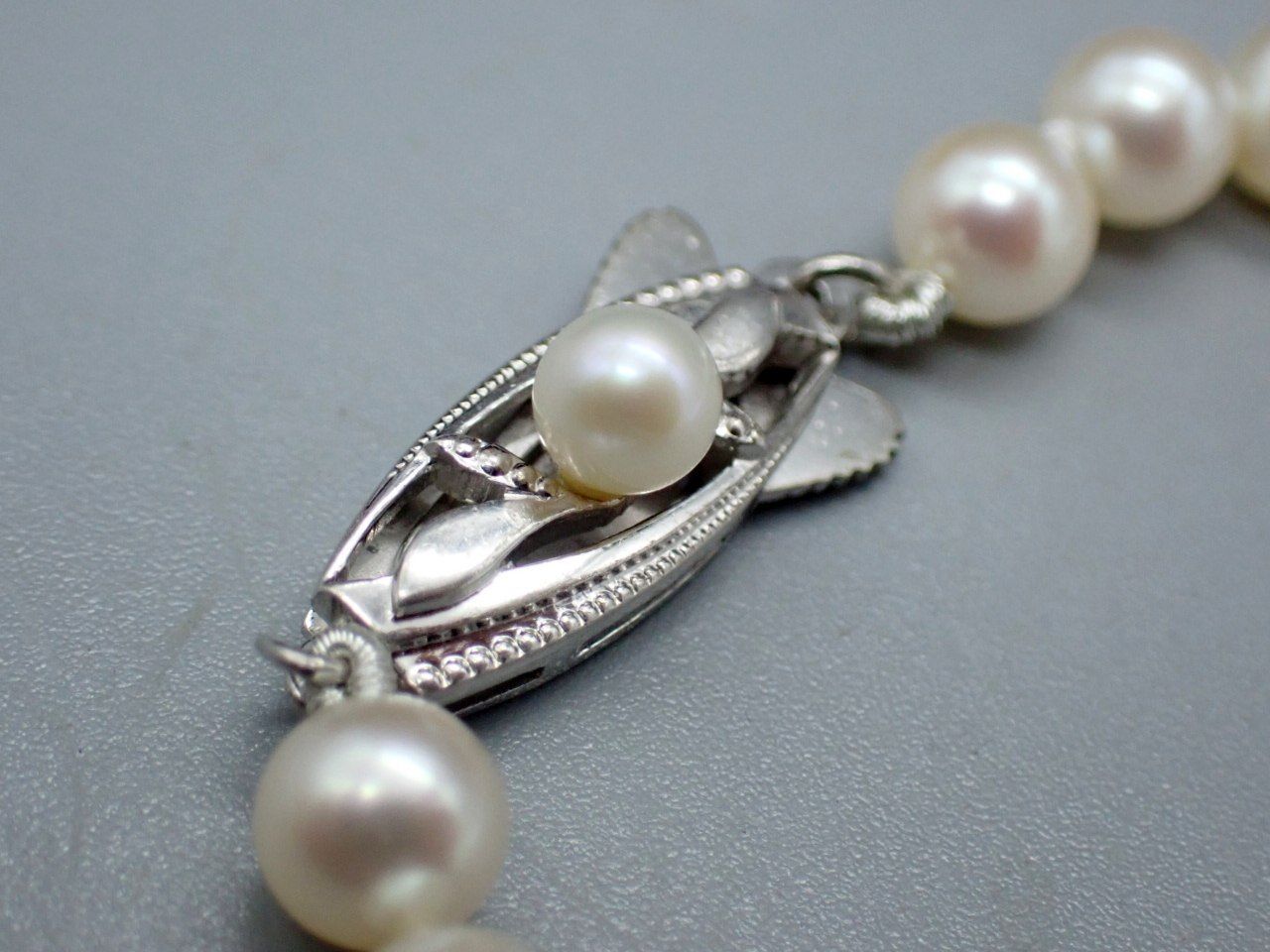 MIKIMOTO Akoya Pearl Necklace with 5.5mm pearls, 38cm length, displayed with original case