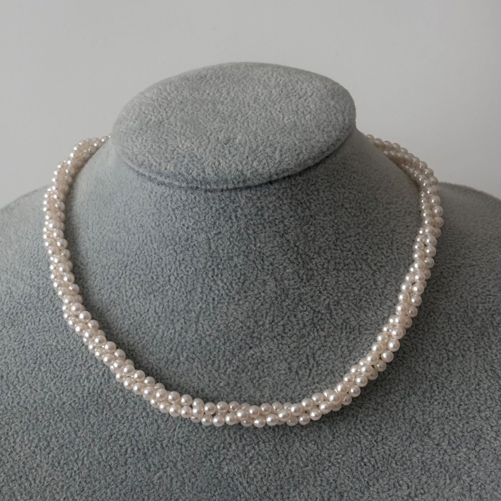 188 Tasaki silver three-row necklace featuring baby pearls and a ribbon clasp, 42.5 cm length