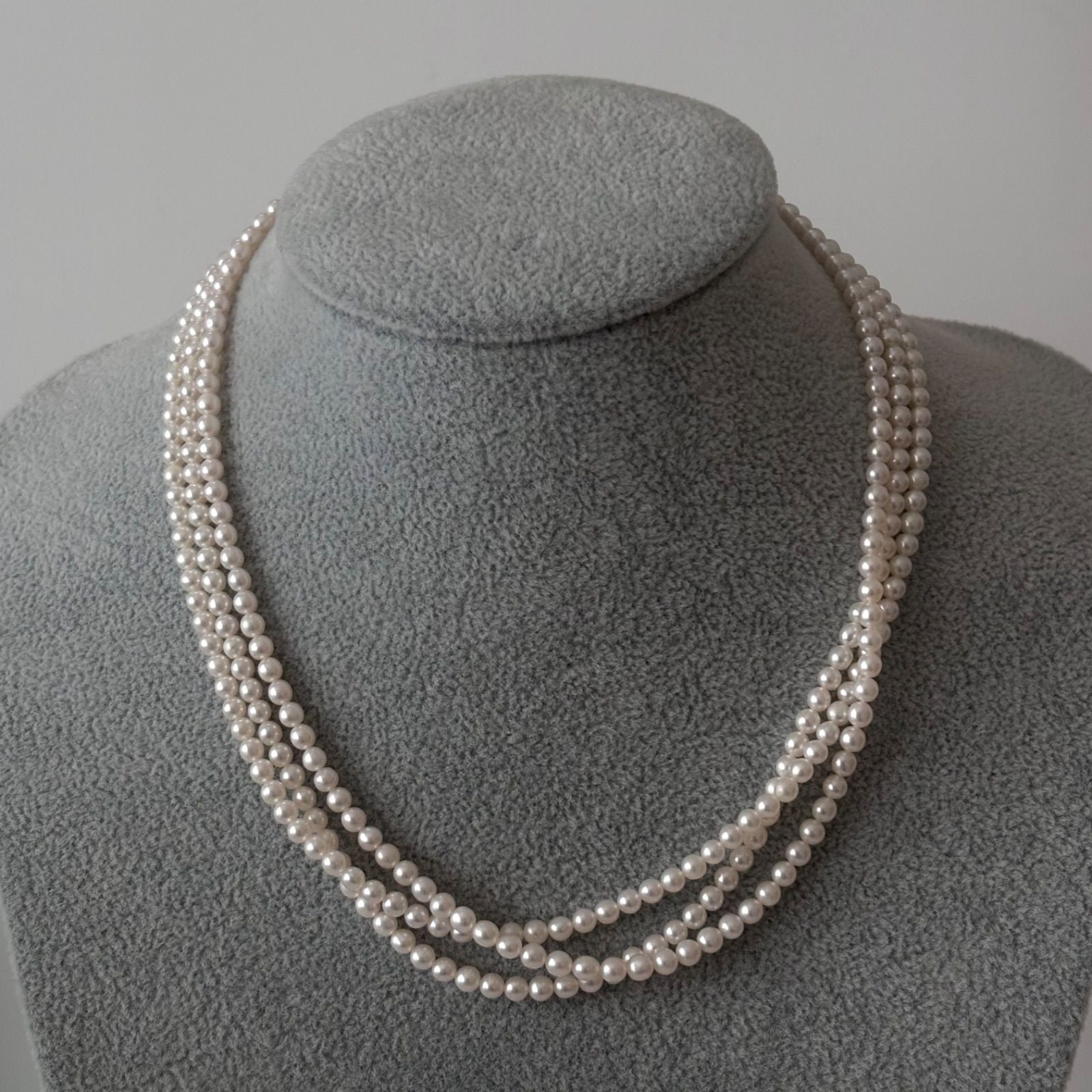 188 Tasaki silver three-row necklace featuring baby pearls and a ribbon clasp, 42.5 cm length