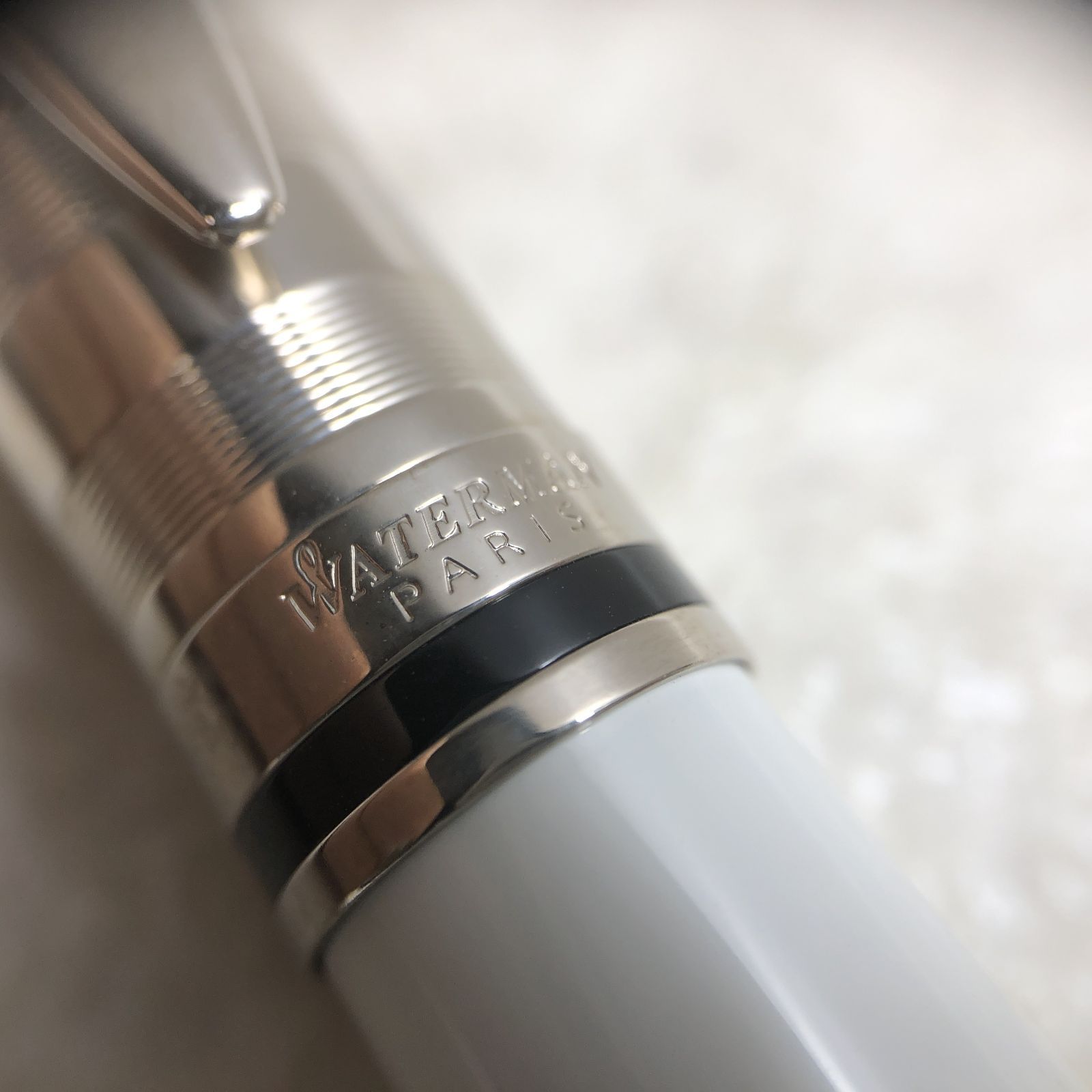 Waterman Expert Deluxe White Ballpoint Pen model 263532061 with sleek white finish and silver accents