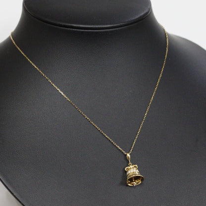 Mikimoto K18 diamond pendant featuring bell motif with 0.15ct diamond on 40cm chain