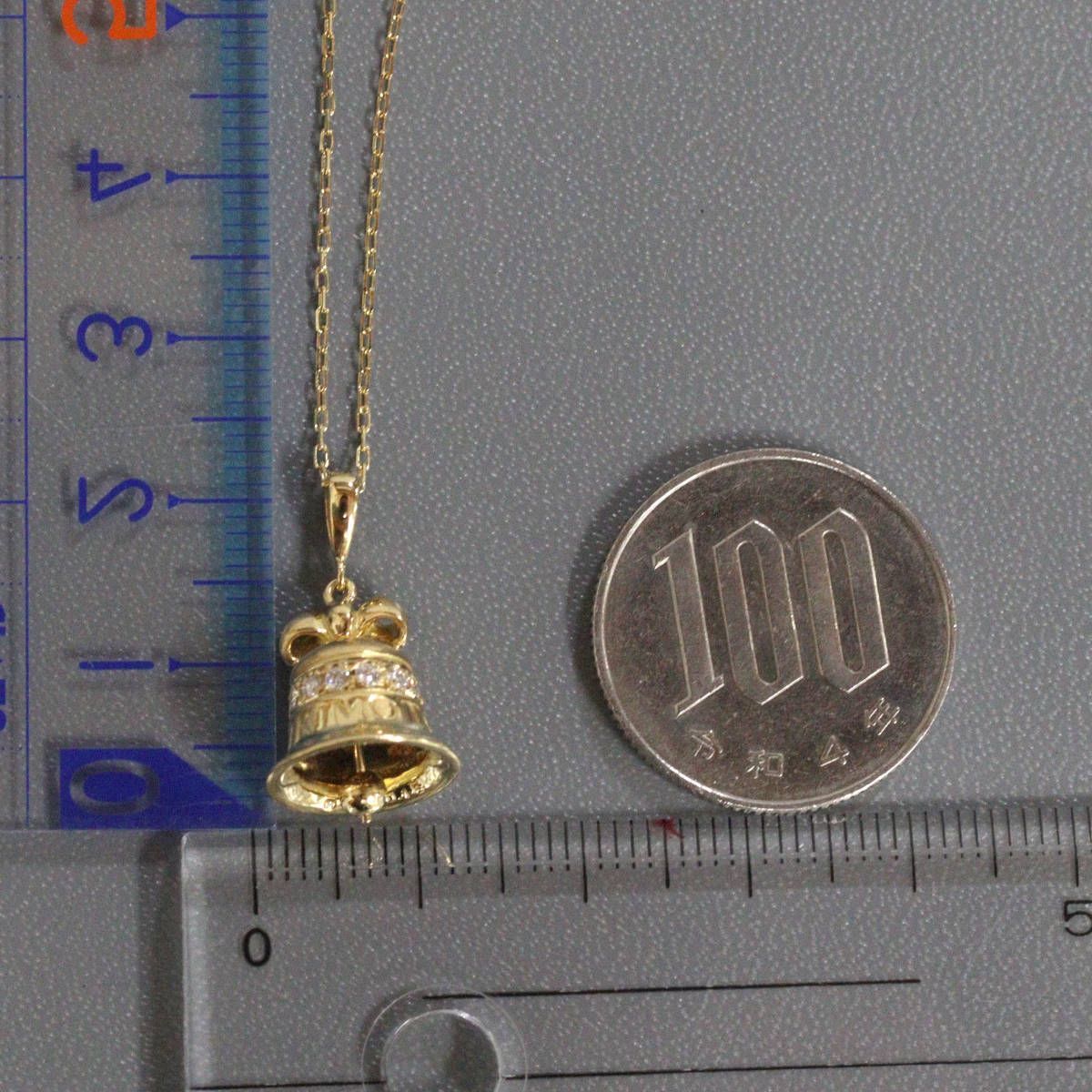 Mikimoto K18 diamond pendant featuring bell motif with 0.15ct diamond on 40cm chain