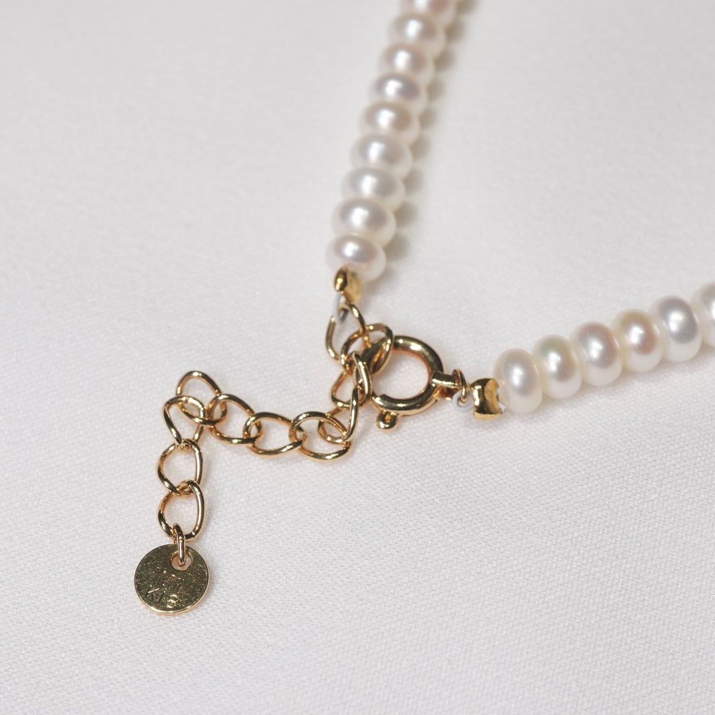 Mikimoto Perleta K18 baby pearl necklace with gold chain in excellent condition
