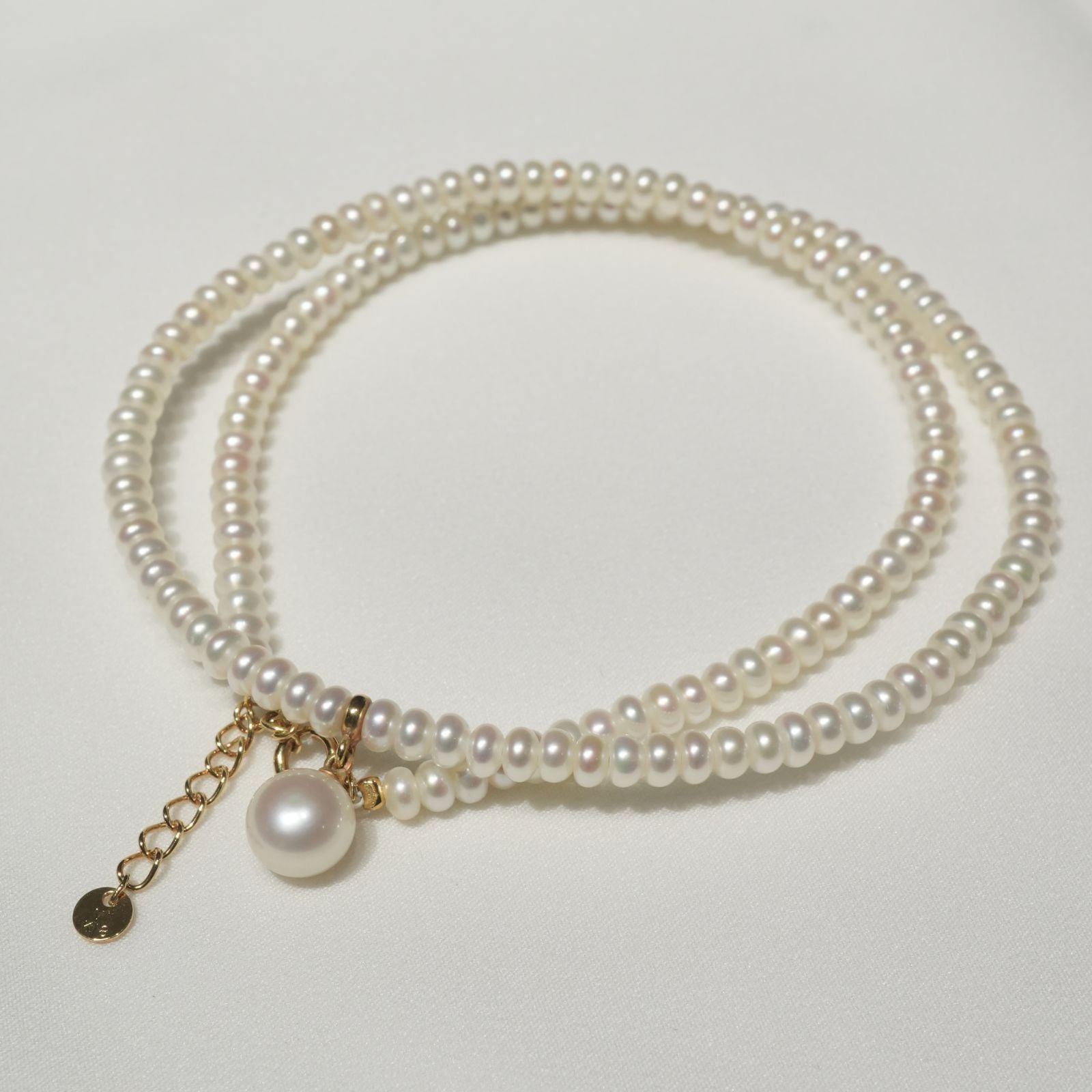 Mikimoto Perleta K18 baby pearl necklace with gold chain in excellent condition