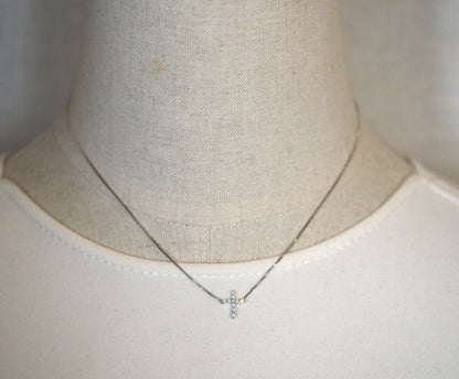 Agete Law K10WG diamond cross necklace in 10 karat white gold with pouch