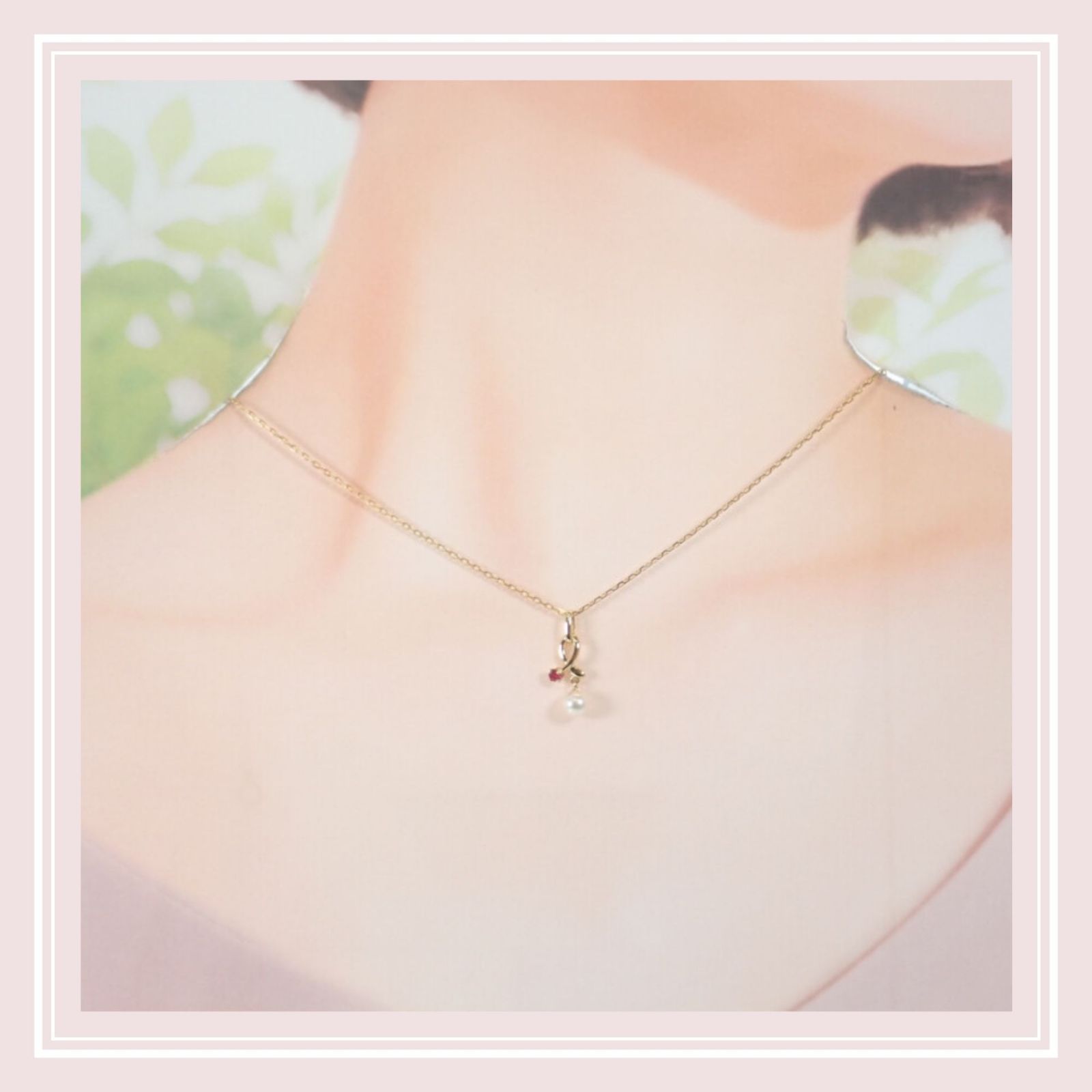 Mikimoto 18K yellow gold pendant necklace with ruby and 5.1mm Akoya pearl on 38cm chain displayed with box