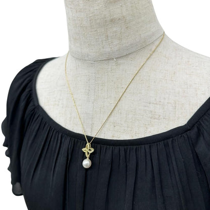 Akoya pearl 9.0mm diamond necklace set in 18K gold with 45cm chain shown on white background