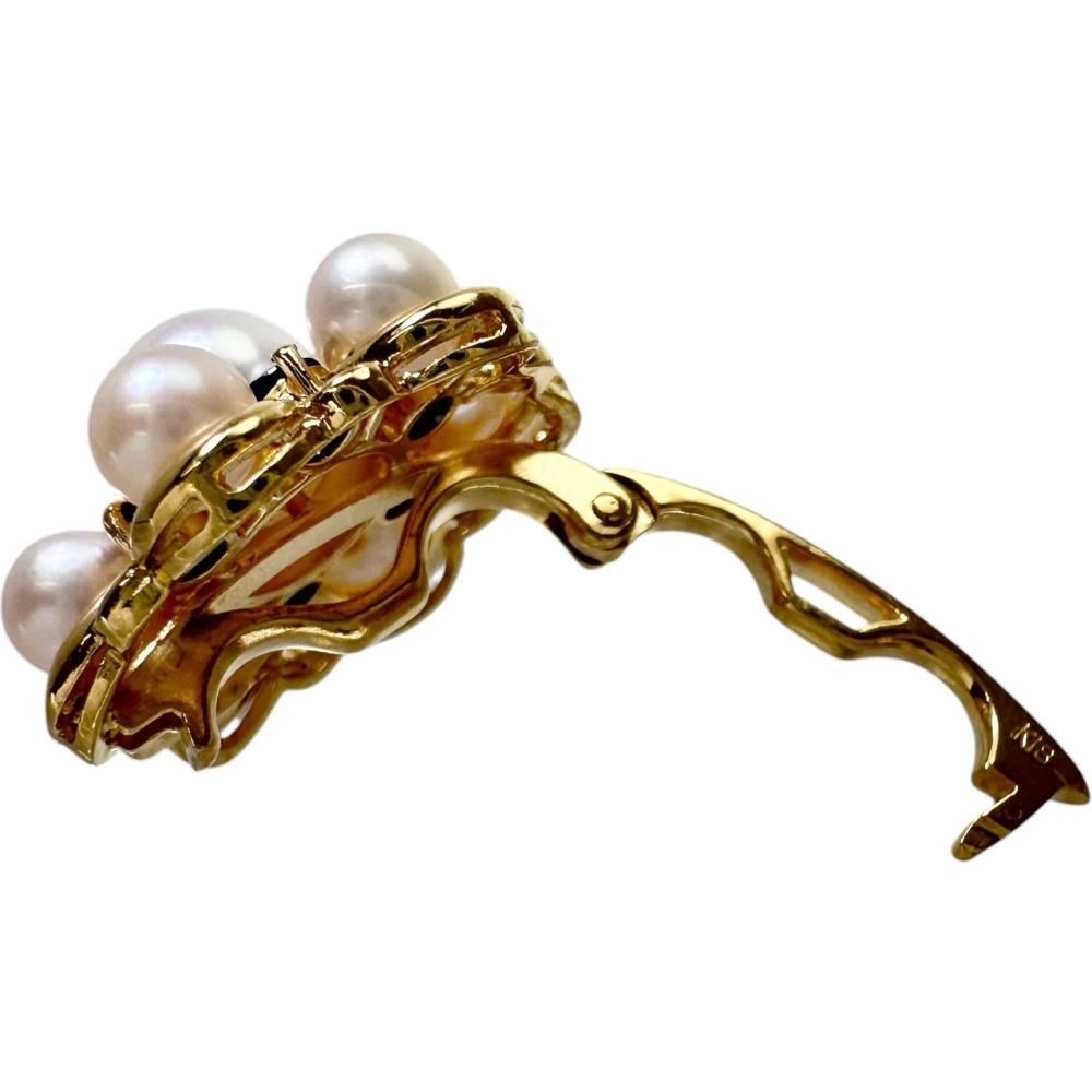 Akoya pearl and sapphire pendant top set in 18k gold with a 6.8 mm pearl and sapphire stones