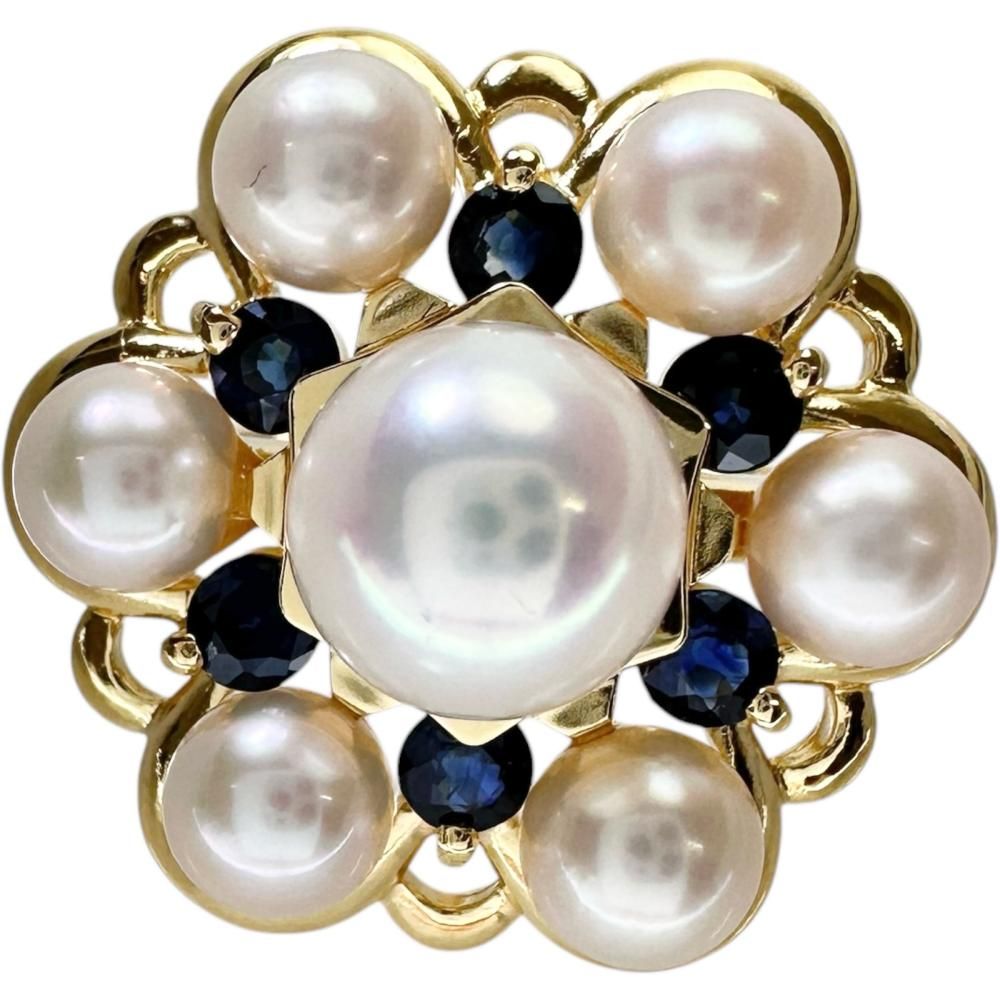 Akoya pearl and sapphire pendant top set in 18k gold with a 6.8 mm pearl and sapphire stones