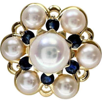 Akoya pearl and sapphire pendant top set in 18k gold with a 6.8 mm pearl and sapphire stones