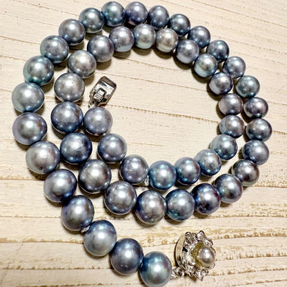 Honmei pearl necklace featuring 8mm blue gray pearls and silver engraved clasp on a white background