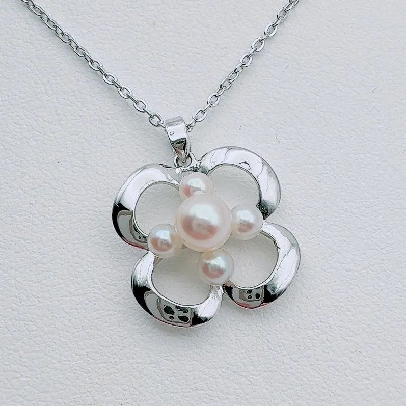 MIKIMOTO silver necklace with 2 cm pendant and 6-3 mm pearls on a 41 cm chain