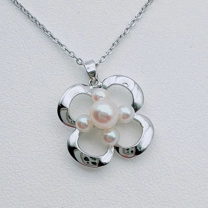 MIKIMOTO silver necklace with 2 cm pendant and 6-3 mm pearls on a 41 cm chain
