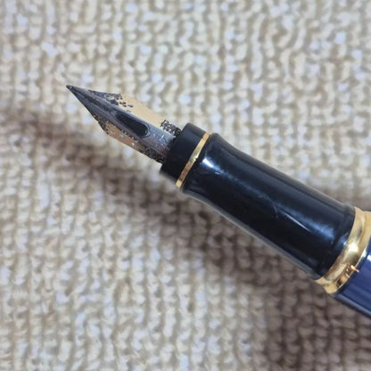 Waterman Expert fountain pen in blue with gold trim and fine nib, displayed with original stained box