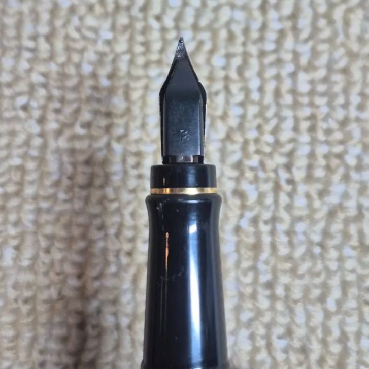Waterman Expert fountain pen in blue with gold trim and fine nib, displayed with original stained box