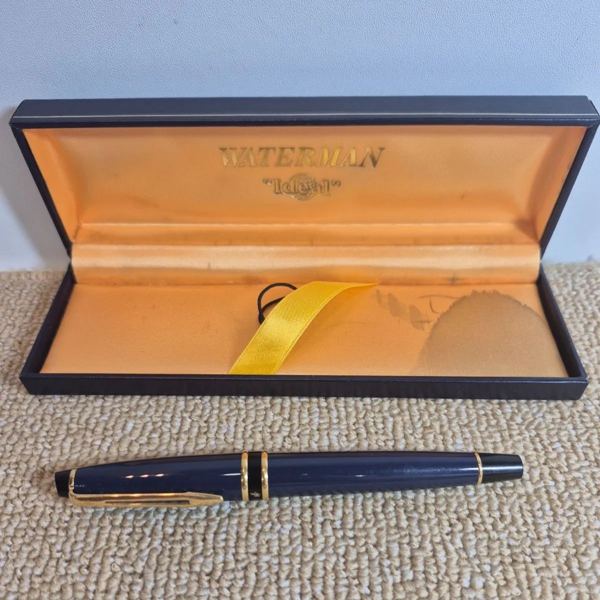 Waterman Expert fountain pen in blue with gold trim and fine nib, displayed with original stained box