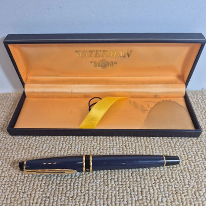 Waterman Expert fountain pen in blue with gold trim and fine nib, displayed with original stained box