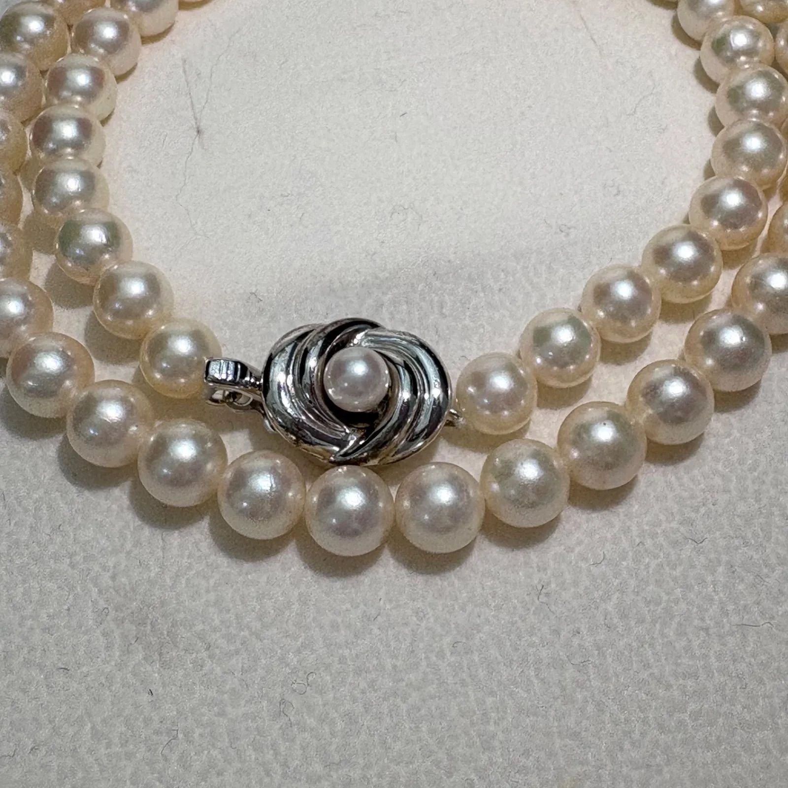 TASAKI Akoya pearl necklace featuring 6.5-7.0mm pearls and silver clasp on a 43cm strand