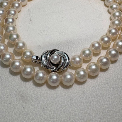 TASAKI Akoya pearl necklace featuring 6.5-7.0mm pearls and silver clasp on a 43cm strand