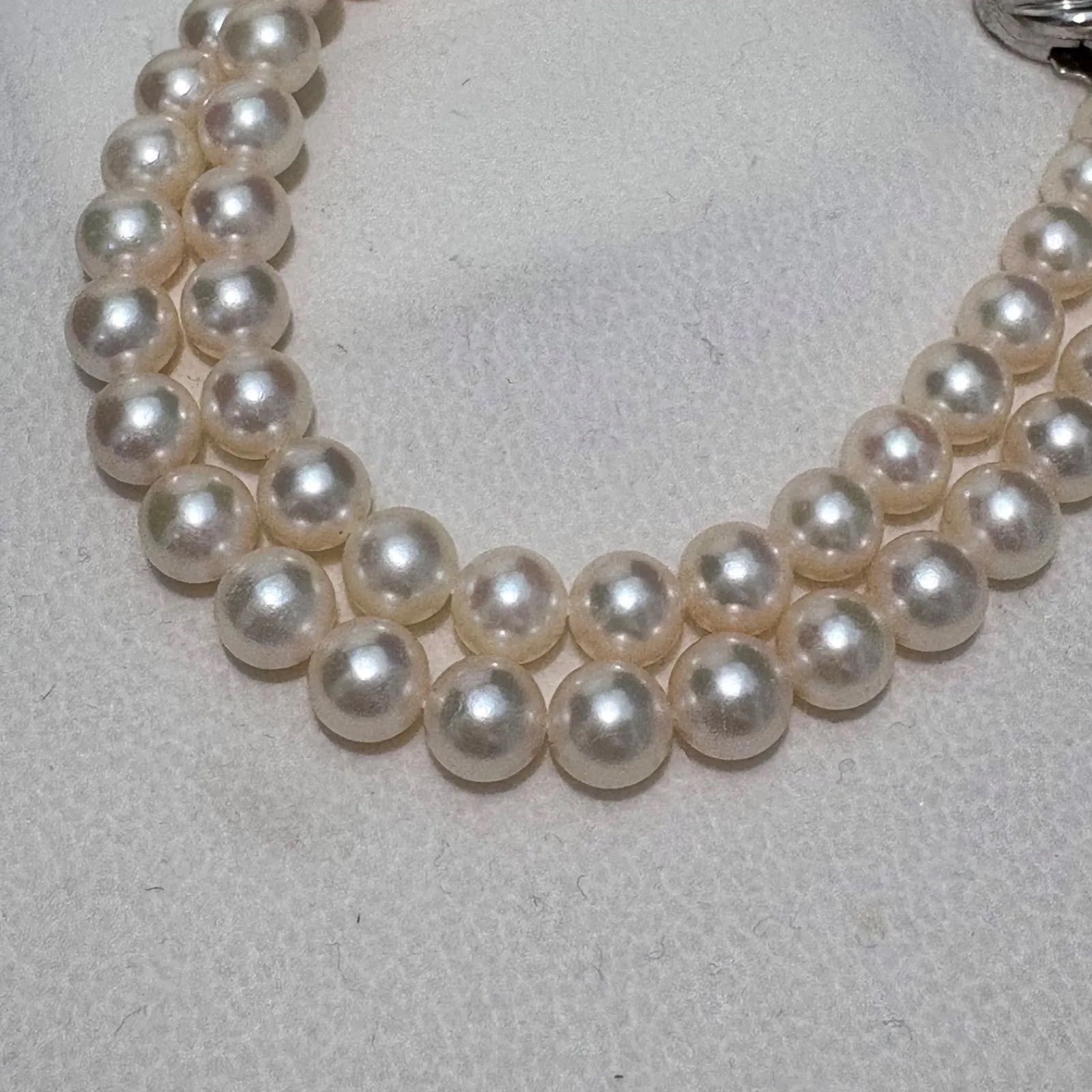 TASAKI Akoya pearl necklace featuring 6.5-7.0mm pearls and silver clasp on a 43cm strand