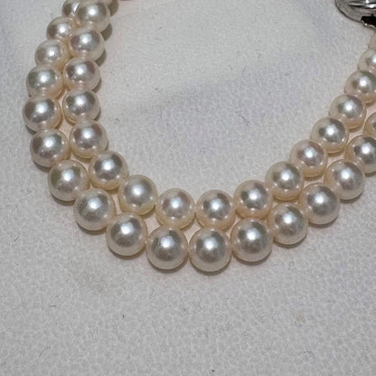 TASAKI Akoya pearl necklace featuring 6.5-7.0mm pearls and silver clasp on a 43cm strand