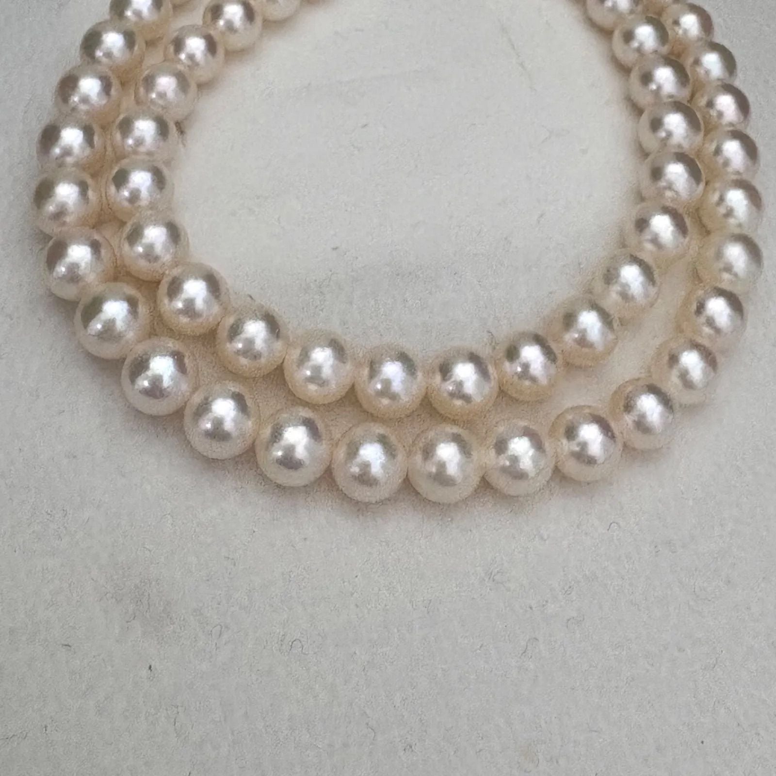 TASAKI Akoya pearl necklace featuring 6.5-7.0mm pearls and silver clasp on a 43cm strand
