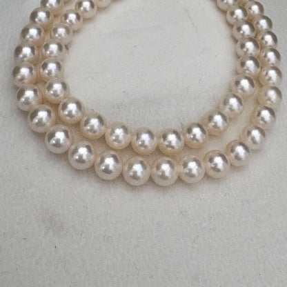TASAKI Akoya pearl necklace featuring 6.5-7.0mm pearls and silver clasp on a 43cm strand
